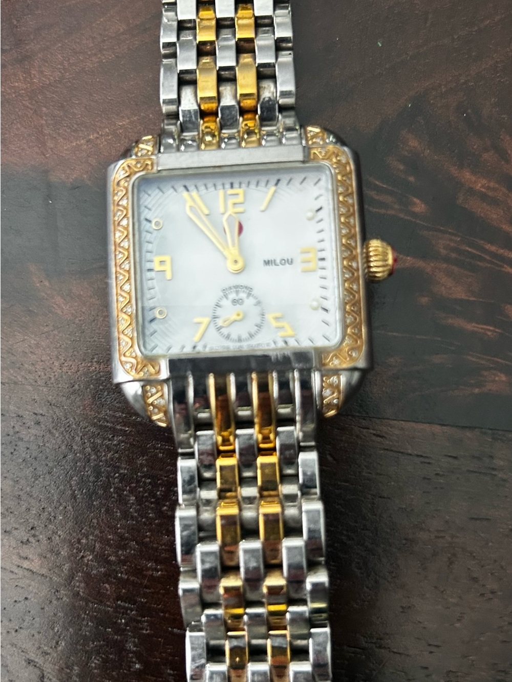 100% Authentic  Michele Milou silver and gold watch in great condition.